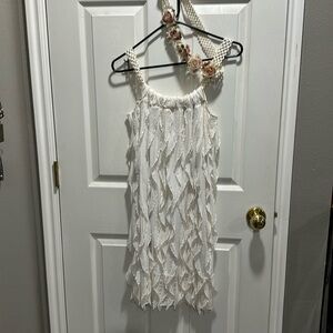 White with gold detail dress.